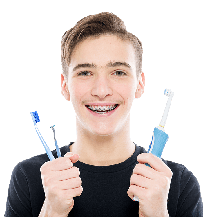 https://pavlou-orthodontics.gr/wp-content/uploads/2021/01/teenager-holds-a-toothbrush-and-brush-for-braces.png